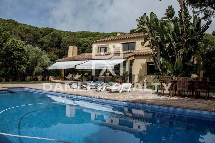 Villa near the beach surrounded by green areas