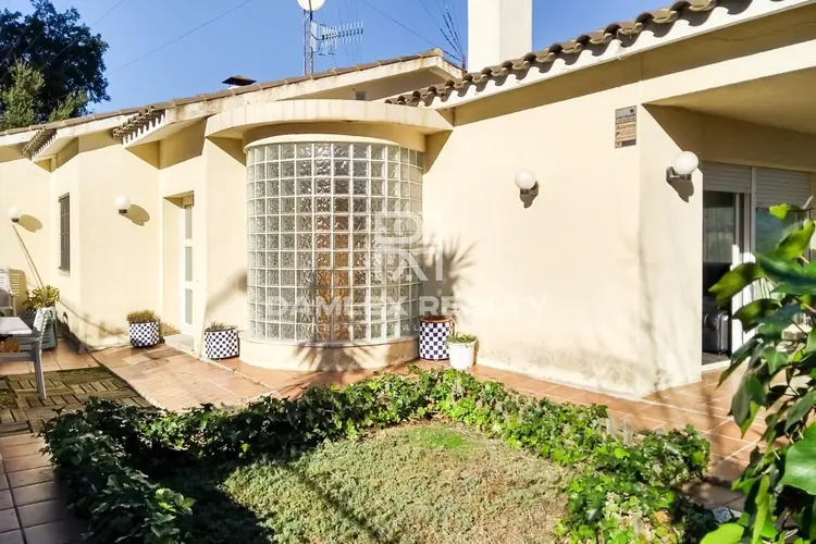 Property on a large corner plot with sea views.